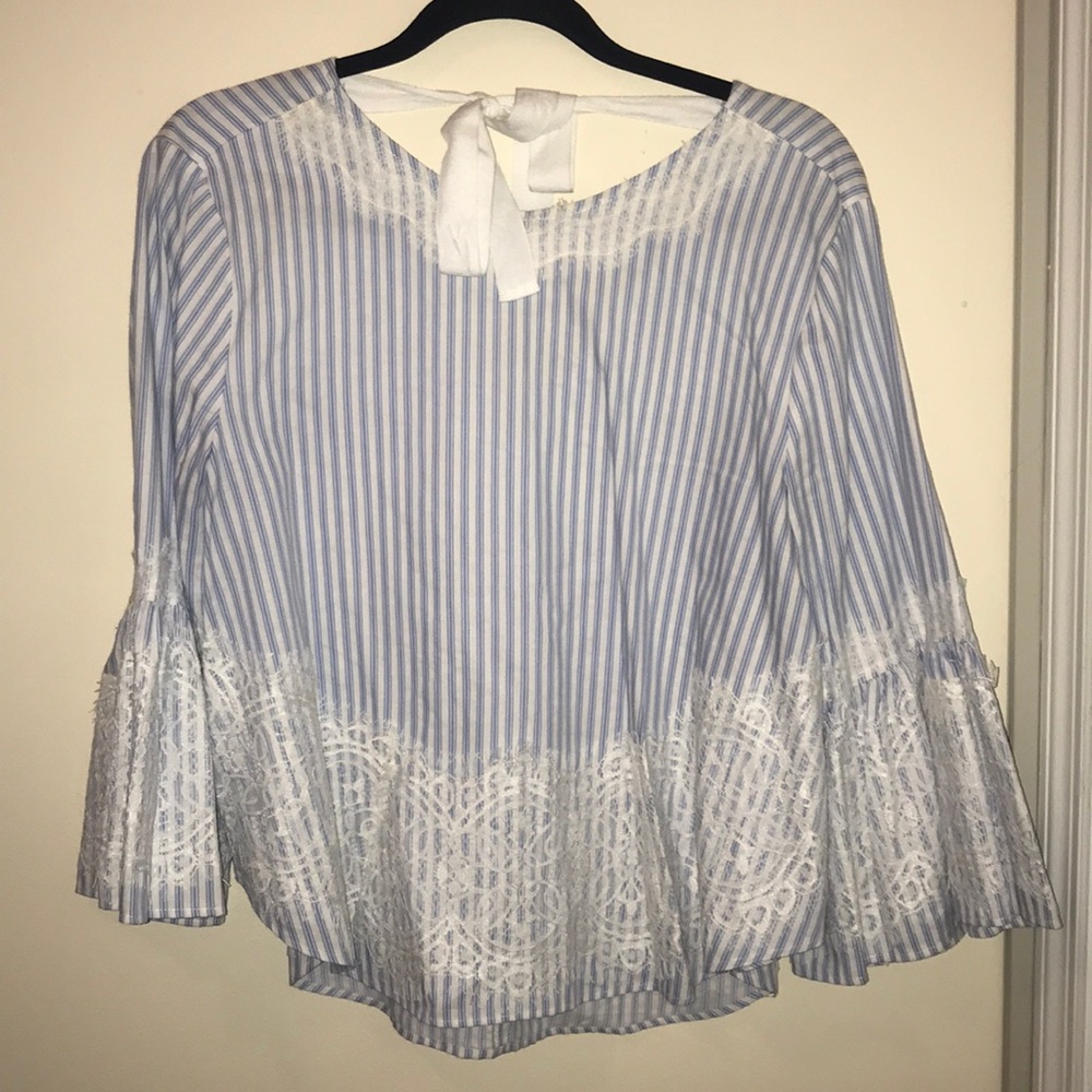 Bell sleeve top with lace details